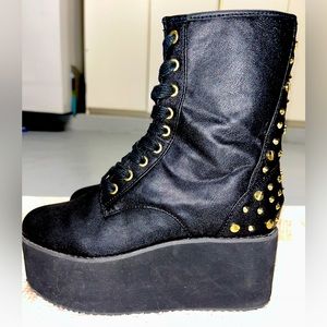 YRU black platform shoes with gold studs